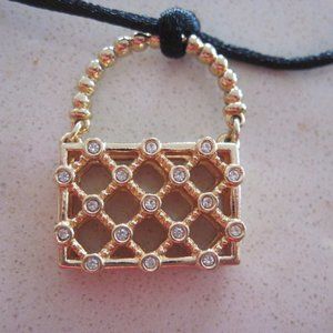 FLASH SALE Swarovski Swan Signed Basket Weave Purse on necklace cord.